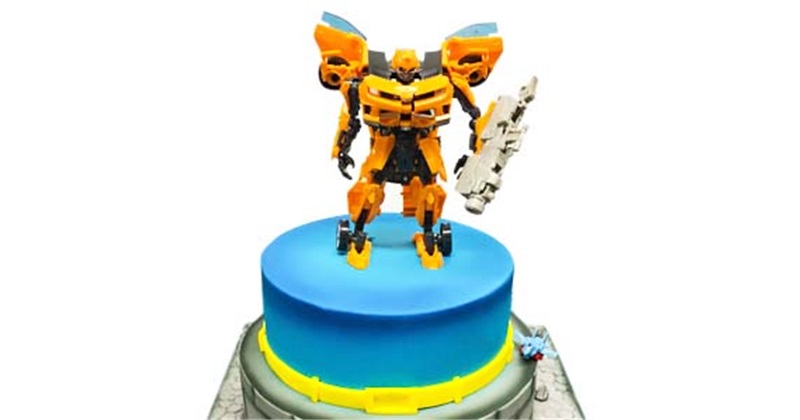 Transformers themed featuring Bumblebee and Optimus 2 tiers Cake