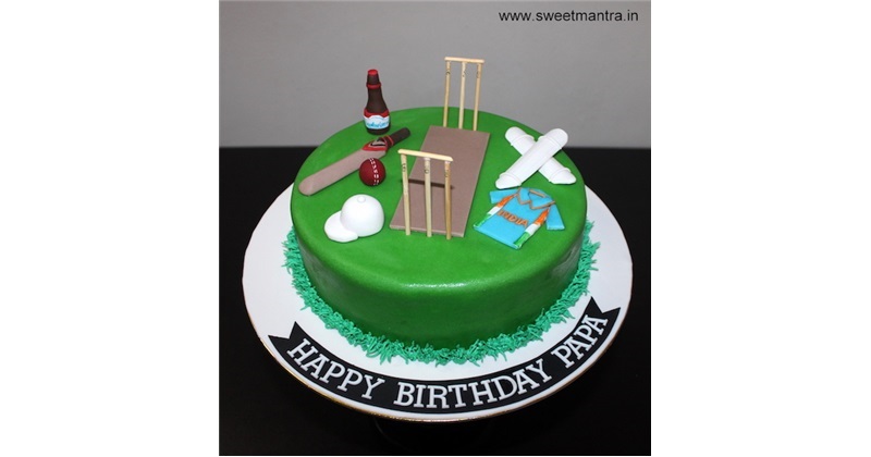 Cricket ball and bat cake